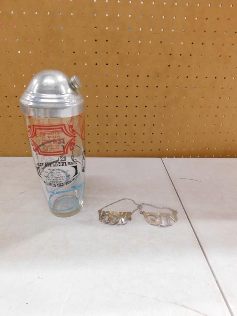 Bar Lot incl Vintage Cocktail Shaker and Vodka and Gin Decanter Labels: Bar Lot incl Vintage Cocktail Shaker and Vodka and Gin Decanter Labels All pictures are considered part of the description and should be examined carefully by bidders. Live Auctioneers is now offeri