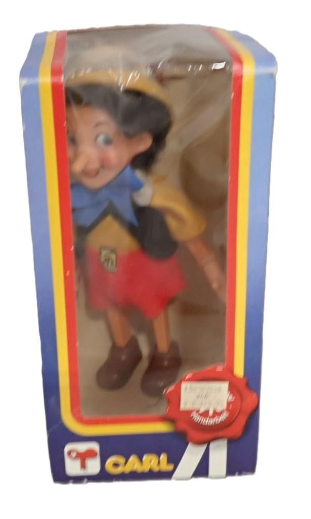 Vintage Carl Wind-Up Pinocchio with original box: Vintage Carl Wind-Up Pinocchio with original box All pictures are considered part of the description and should be examined carefully by bidders. Live Auctioneers is now offering Live Shipping through