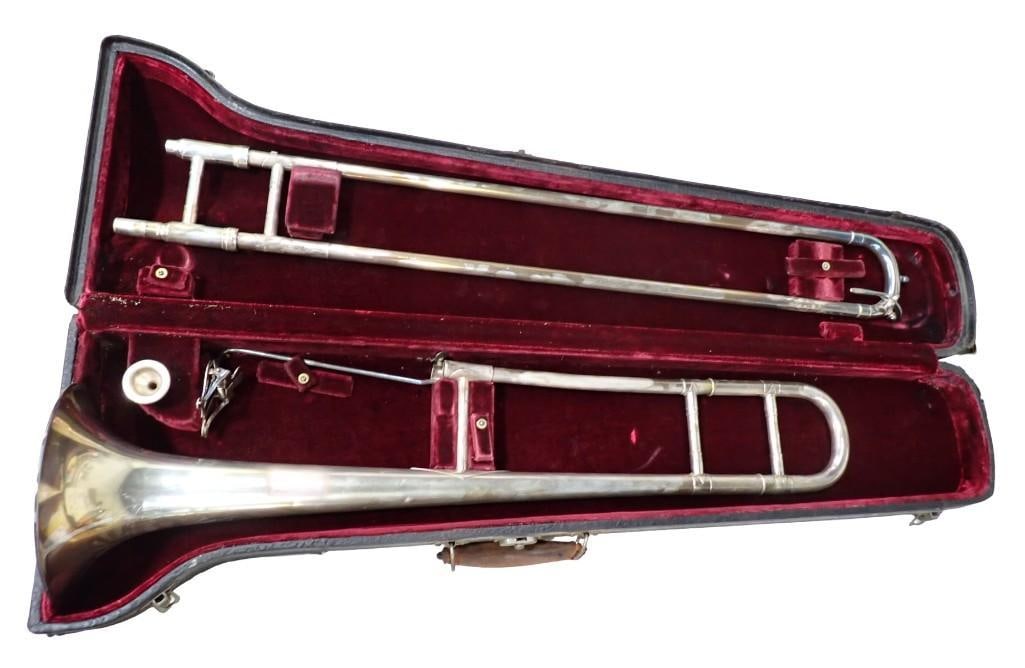 William Lewis & Son Master Kraft Trombone with case - appears to be silver plate: William Lewis & Son Master Kraft Trombone with case - appears to be silver plate All pictures are considered part of the description and should be examined carefully by bidders. Live Auctioneers i