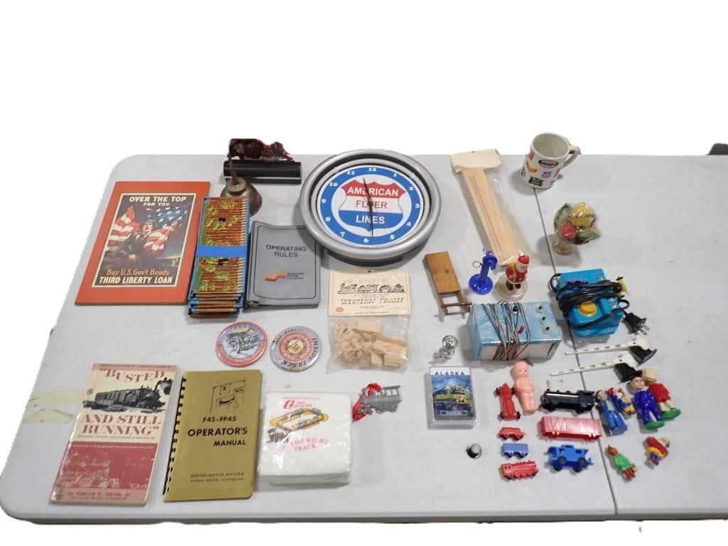 Misc. Lot including American Flyer Clock, Model Train Accessories, Ephemera, Small Figures, Books (1 of 10)