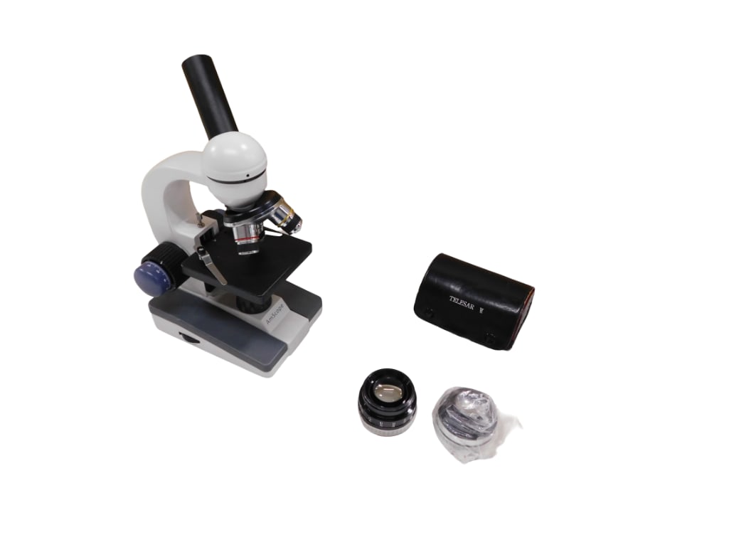 Student Microscope AMScope plus a couple of Telesar Lenses: Student Microscope AMScope plus a couple of Telesar Lenses Lenses don't fit the microscope and it looks like the microscope is missing the eye piece lens. All pictures are considered part of the d