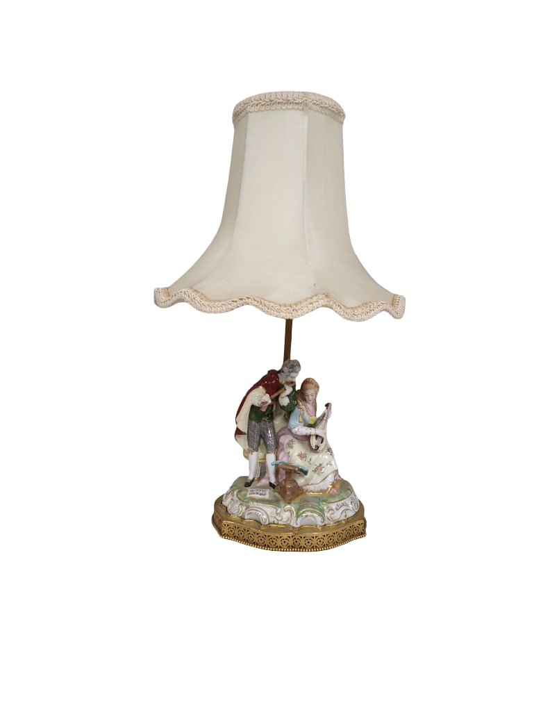 Vintage Lamp with Porcelain Figural Base: Vintage Lamp with Porcelain Figural Base and a nice shade All pictures are considered part of the description and should be examined carefully by bidders. Live Auctioneers is now offering Live Shippin