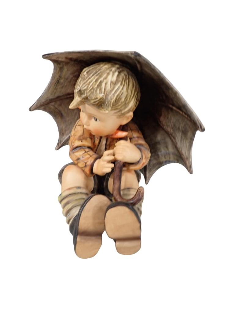 Goebel Hummel Umbrella Boy Figurine: Goebel Hummel Umbrella Boy Figurine All pictures are considered part of the description and should be examined carefully by bidders. Live Auctioneers is now offering Live Shipping through them. This