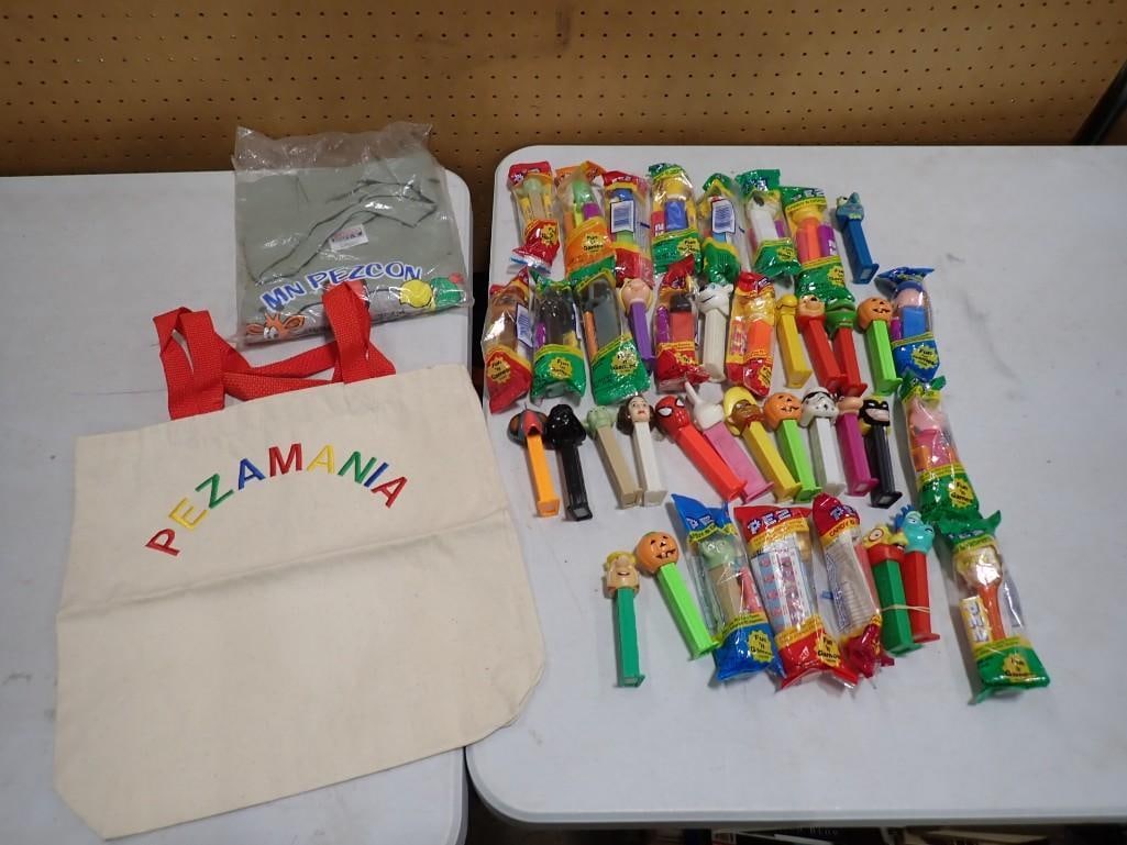 Lot of Pez Dispensers plus a Pezamania Tote Bag and MN Pezcon Shirt: Lot of Pez Dispensers plus a Pezamania Tote Bag and MN Pezcon Shirt. Includes new in package pez dispensers and loose. All pictures are considered part of the description and should be examined