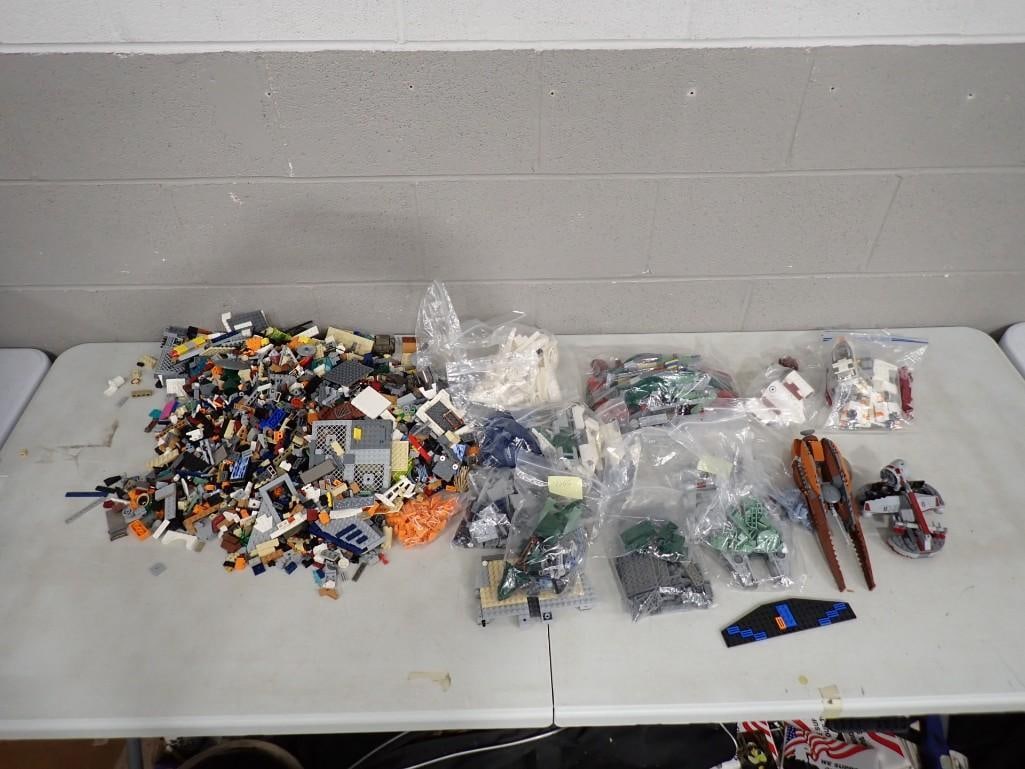 Lot of Lego and Lego Style Bricks and Pieces: Lot of Lego and Lego Style Bricks and Pieces All pictures are considered part of the description and should be examined carefully by bidders. Live Auctioneers is now offering Live Shipping through t