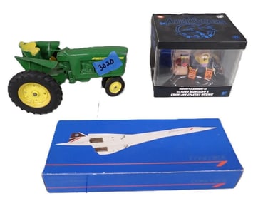 Toy Lot including Concord Airplane Model, John Deer Tractor, The Angry Beavers Daggett & Norbert