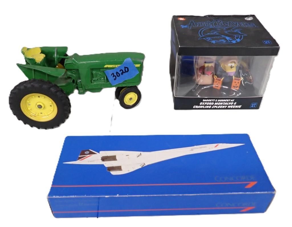 Toy Lot including Concord Airplane Model, John Deer Tractor, The Angry Beavers Daggett & Norbert (1 of 5)