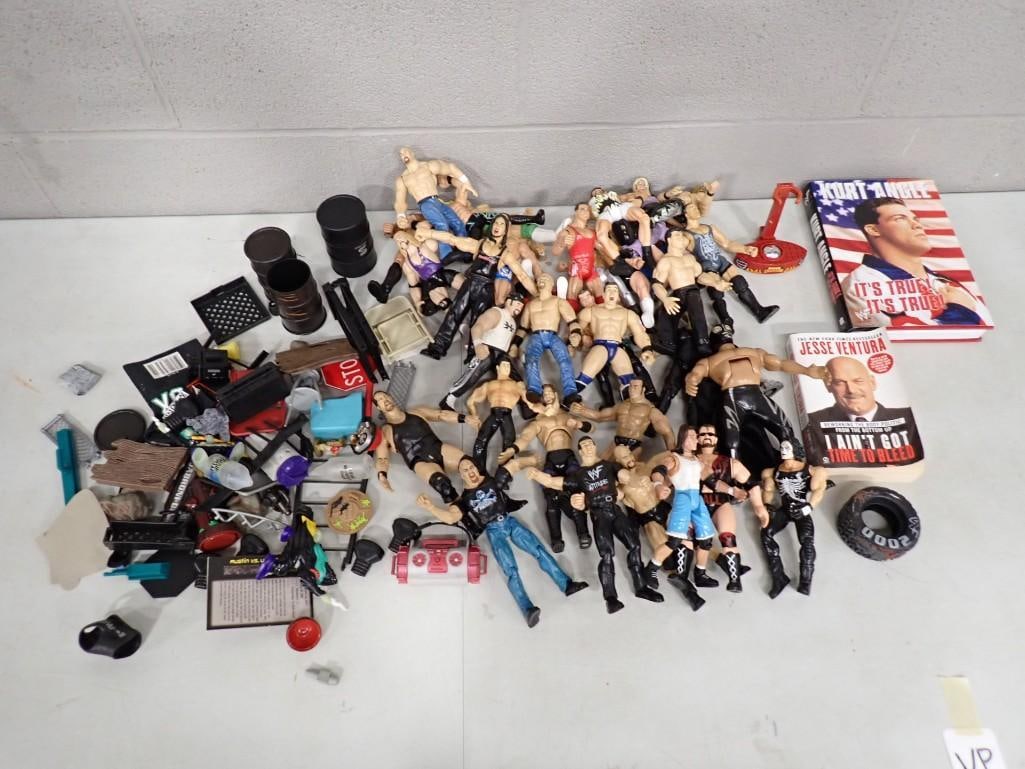 Lot of WWE WWF Wrestling Action Figures, Toys, Books, Etc: Lot of WWE WWF Wrestling Action Figures, Toys, Books, Etc All pictures are considered part of the description and should be examined carefully by bidders. Live Auctioneers is now offering Live Shipp