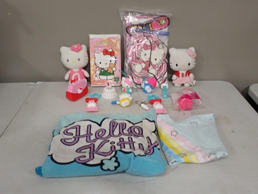 Hello Kitty Lot including Plush, Movie, Figures, Towel, Shirt, Key Chain, etc.: Hello Kitty Lot including Plush, Movie, Figures, Towel, Shirt, Key Chain, etc. All pictures are considered part of the description and should be examined carefully by bidders. Live Auctioneers is now