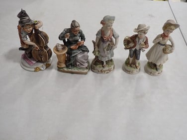 Lot of assorted Porcelain Figurines including Cello Player