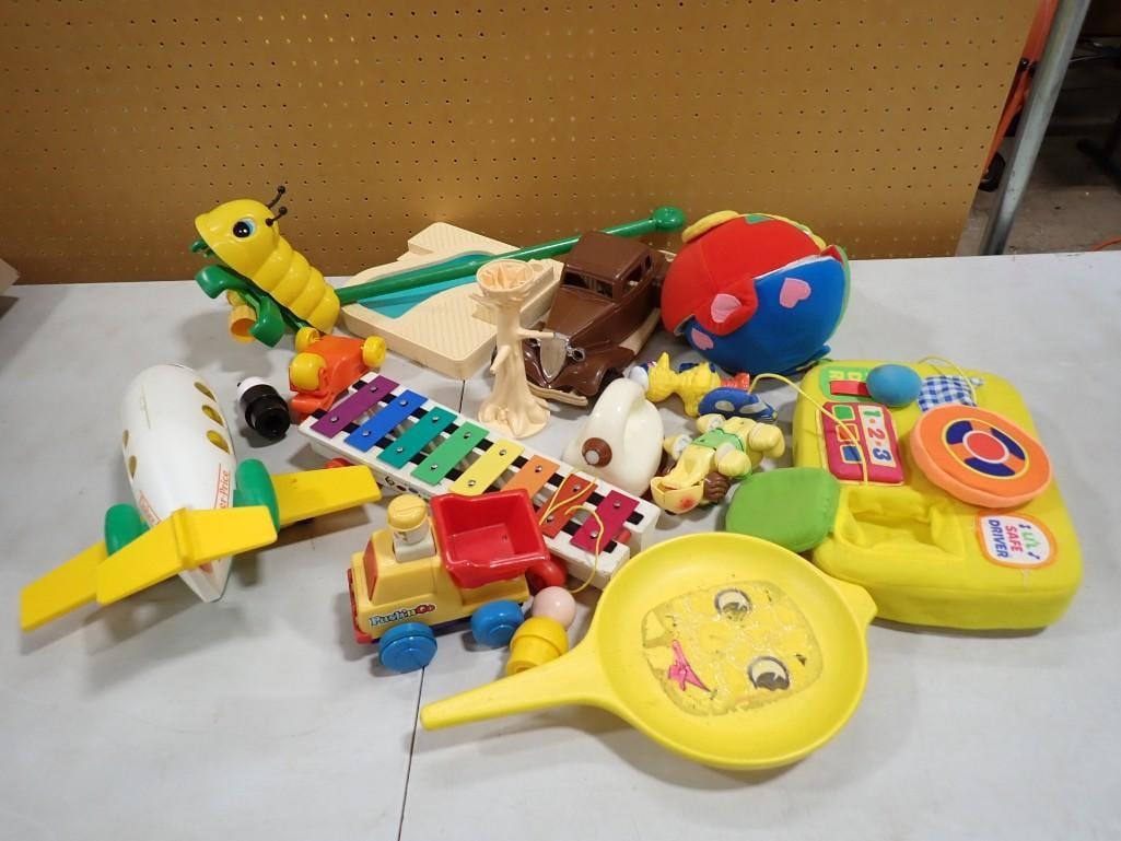 Vintage Toy Lot including Fisher Price Airplane, Xylophone, Push n' Go, Lil Safe Driver, Little Peop: Vintage Toy Lot including Fisher Price Airplane, Xylophone, Push n' Go, Lil Safe Driver, Little People, etc. All pictures are considered part of the description and should be examined carefully by