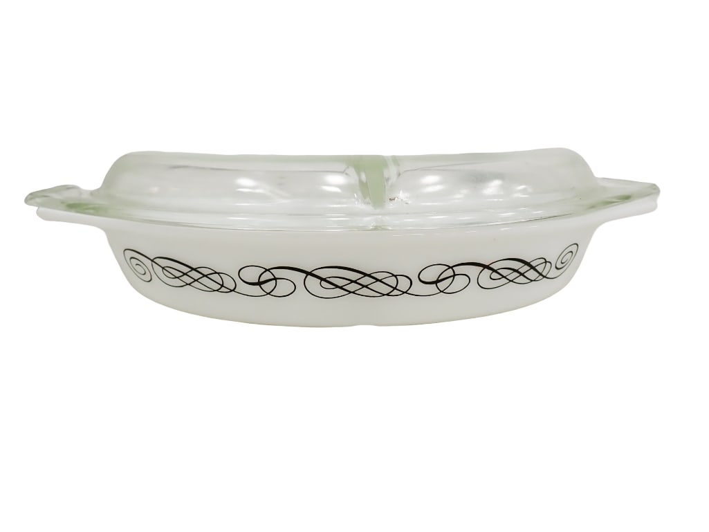 Vintage Pyrex 1960s Promotional Pattern Black Scroll 1 1/2 Qt. Divided Casserole with Glass Lid: Vintage Pyrex 1960s Promotional Pattern Black Scroll 1 1/2 Qt. Divided Casserole Dish with Glass Lid All pictures are considered part of the description and should be examined carefully by bidde