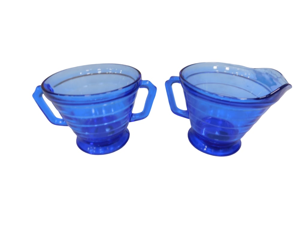 Vintage Hazel Atlas Moderntone Cobalt Blue Cream and Sugar Bowls: Vintage Hazel Atlas Moderntone Cobalt Blue Cream and Sugar Bowls. All pictures are considered part of the description and should be examined carefully by bidders. Live Auctioneers is now offering Live