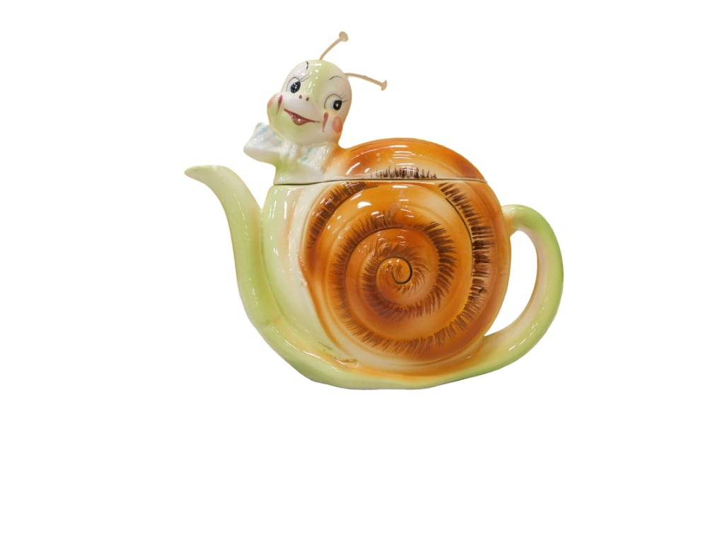 Vintage Lefton Snappy Snail Teapot: Vintage Lefton Snappy Snail Teapot. All pictures are considered part of the description and should be examined carefully by bidders. Live Auctioneers is now offering Live Shipping through them. This i