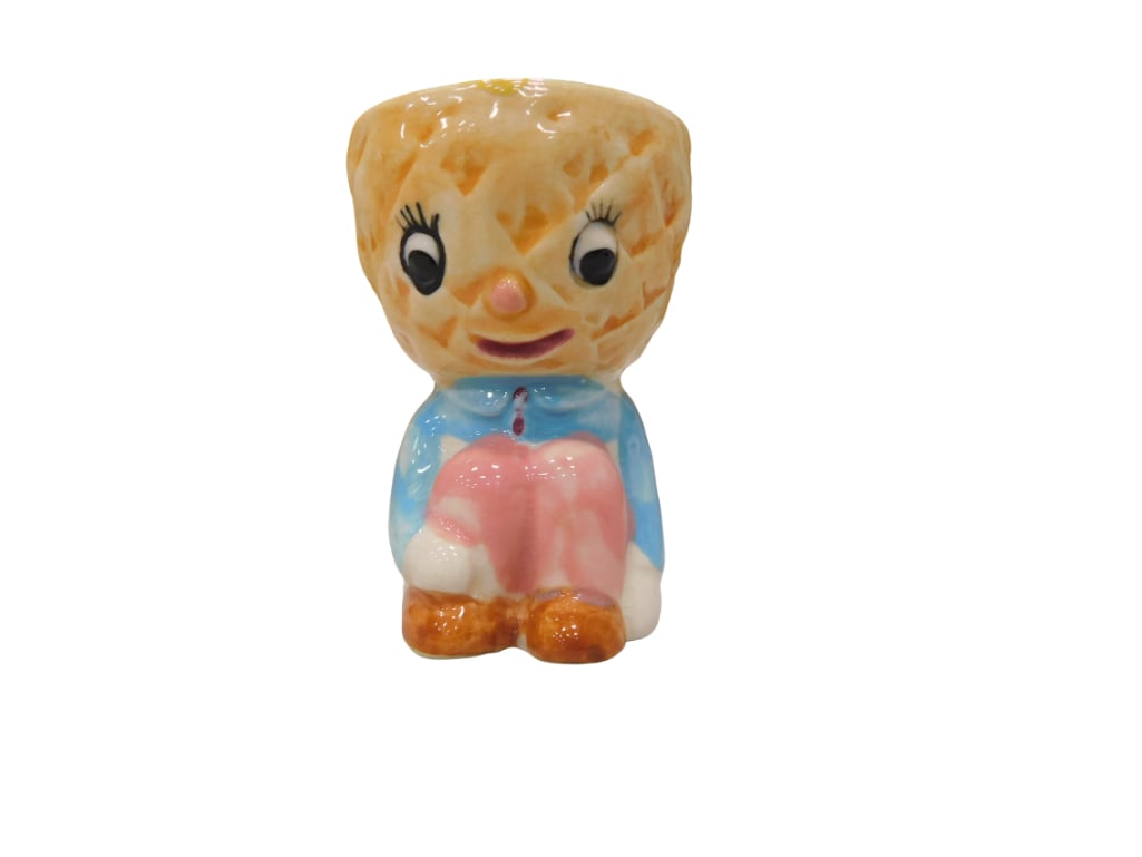 Vintage Anthropomorphic Pineapple Boy Egg Cup: Vintage Anthropomorphic Pineapple Boy Egg Cup. All pictures are considered part of the description and should be examined carefully by bidders. Live Auctioneers is now offering Live Shipping through t