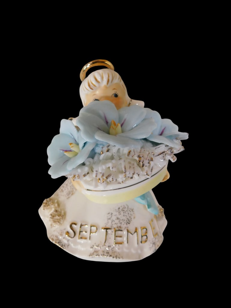 Vintage Lefton Morning Glory Sapphire Angel Marked 489: Vintage Lefton Morning Glory Sapphire Angel Marked 489. All pictures are considered part of the description and should be examined carefully by bidders. Live Auctioneers is now offering Live Shipping