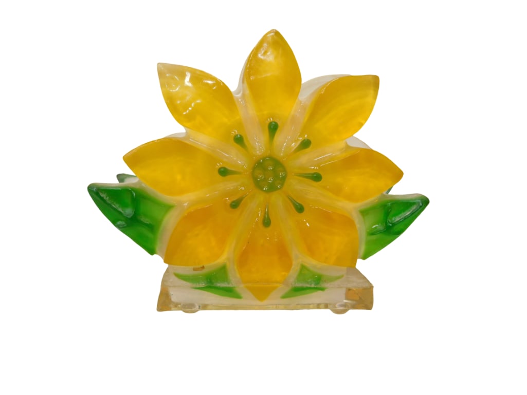 Vintage Lucite Yellow and Green Flower Napkin Holder: Vintage Lucite Yellow and Green Flower Napkin Holder. All pictures are considered part of the description and should be examined carefully by bidders. Live Auctioneers is now offering Live Shipping t