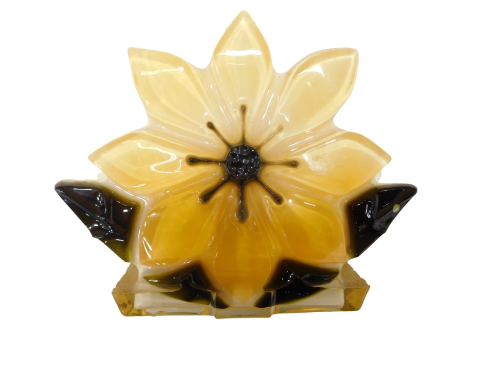 Vintage Lucite Yellow and Brown Flower Napkin Holder: Vintage Lucite Yellow and Brown Flower Napkin Holder. All pictures are considered part of the description and should be examined carefully by bidders. Live Auctioneers is now offering Live Shipping t
