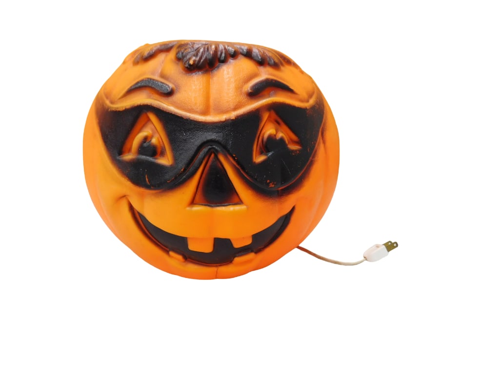 Vintage "Masked Bandit" Halloween Blowmold Jack O Lantern 9" tall: Vintage "Masked Bandit" Halloween Blowmold Jack O Lantern 9" tall . All pictures are considered part of the description and should be examined carefully by bidders. Live Auctioneers is now