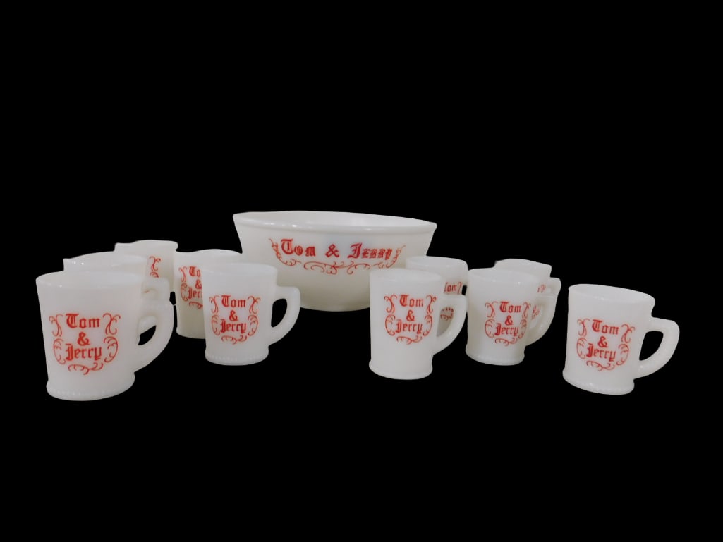 Vintage McKee Tom and Jerry Punch Bowl and 10 Mugs: Vintage McKee Tom and Jerry Punch Bowl and 10 Mugs. All pictures are considered part of the description and should be examined carefully by bidders. Live Auctioneers is now offering Live Shipping thr
