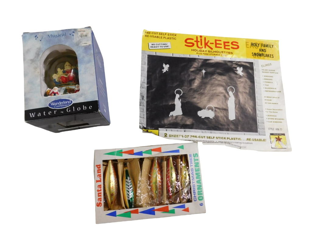 Box of Santa Land Christmas Ornaments, Stik-ees Holiday Silhouettes Window Clings, and Musical Water (1 of 4)