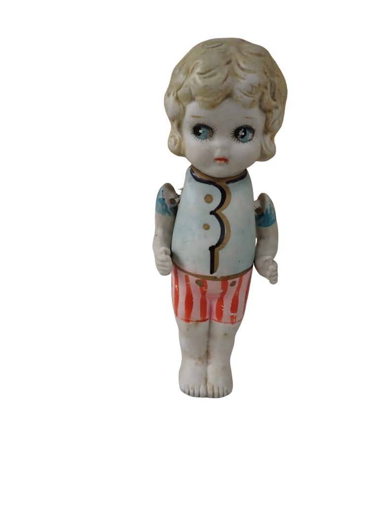 Vintage Bisque Carnival Doll in Patriotic Attire: Vintage Bisque Carnival Doll in Patriotic Attire. All pictures are considered part of the description and should be examined carefully by bidders. Live Auctioneers is now offering Live Shipping throu