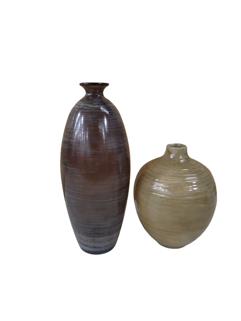 2 Vases. Purple is 16" Tall, Tan Pottery Vase is 11" Tall: 2 Vases. Purple is 16" Tall, Tan Pottery Vase is 11" Tall. All pictures are considered part of the description and should be examined carefully by bidders. Live Auctioneers is now offering Li