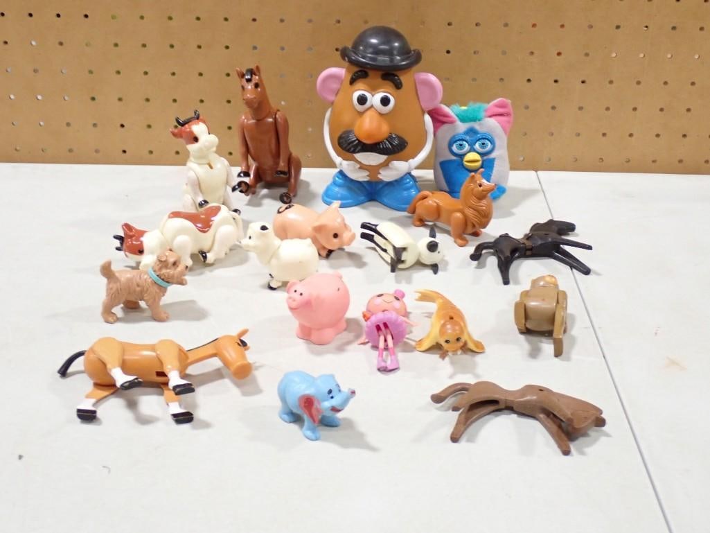Toy Lot including Mr. Potato Head, Furby, Horses, Animals, Play Mobile, etc.: Toy Lot including Mr. Potato Head, Furby, Horses, Animals, Play Mobile, etc. All pictures are considered part of the description and should be examined carefully by bidders. Live Auctioneers is now of