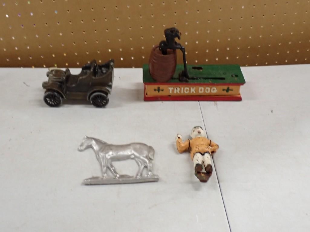 Cast Iron toy and Metal Lot including Trick Dog, Car, Horse, Clown or Jester: Cast Iron toy and Metal Lot including Trick Dog, Car, Horse, Clown or Jester All pictures are considered part of the description and should be examined carefully by bidders. Live Auctioneers is now of