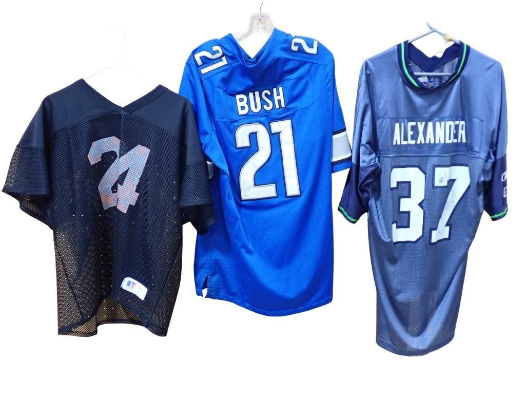 3 Football Jerseys including Detroit Lions Reggie Bush Size L, Seahawks Shaun Alexander Size 2XL: 3 NFL Football Jerseys including Detroit Lions Reggie Bush Size L, Seattle Seahawks Shaun Alexander Size 2XL, Russell Athletic Size XL All pictures are considered part of the description and should be
