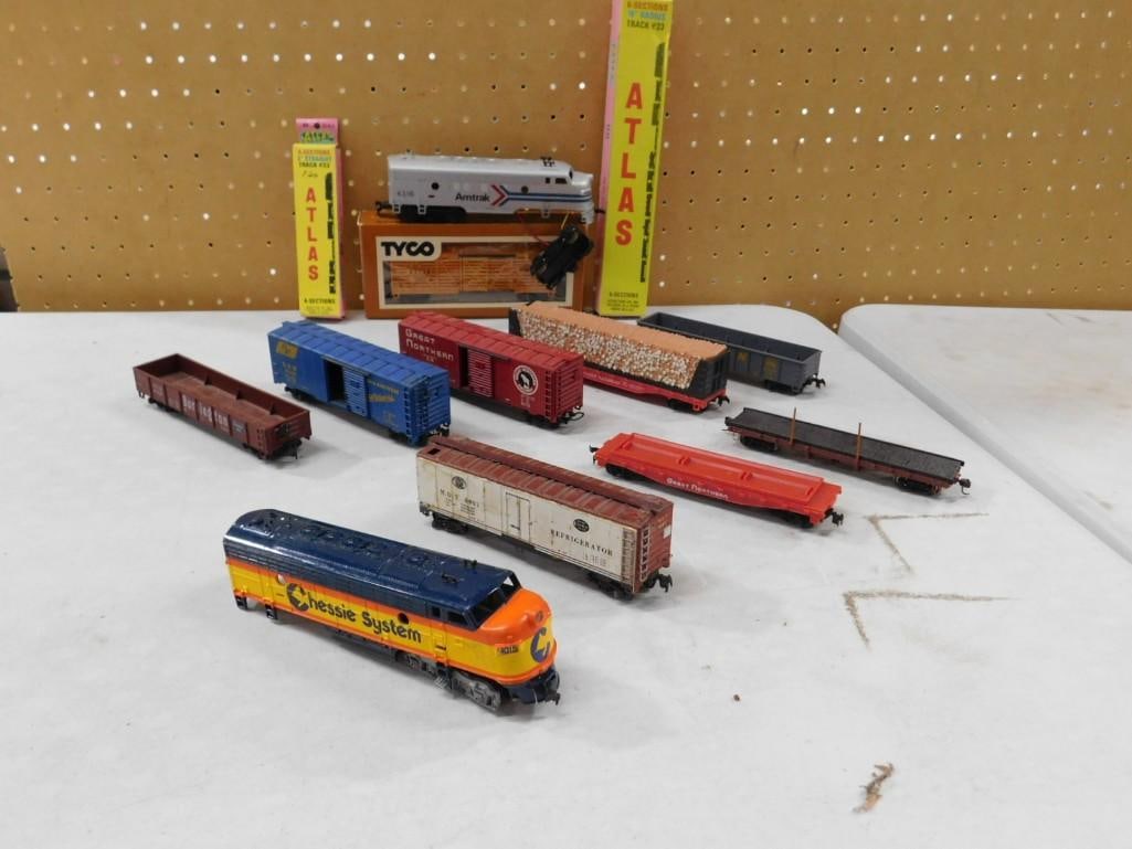 Model Train Lot including Atlas, Tyco, Amtrak, Great Northern, Chessie System, etc.: Model Train Lot including Atlas, Tyco, Amtrak, Great Northern, Chessie System, etc. All pictures are considered part of the description and should be examined carefully by bidders. Live Auctioneers is
