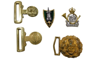 Group of Metal Militaria items; one Welsh guard CYMRU AM BYTH belt locket with leek crest, one Briti