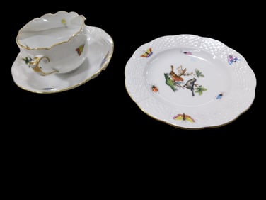 Herend Porcelain in the Rothschild Bird pattern. Including one flat demitasse cup with saucer, shape