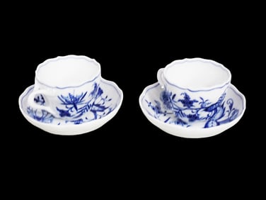 Two Meissen Porcelain Flat Demitasse Cups with Saucers in the Blue Onion pattern. First crossed swor
