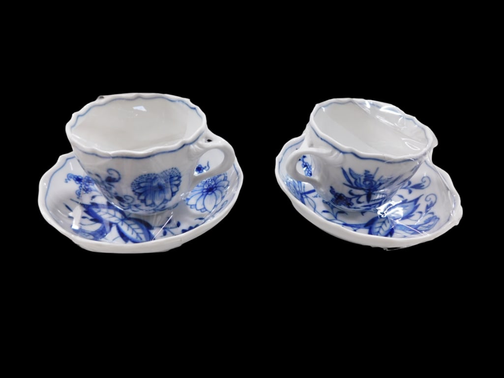 Two Meissen Porcelain Flat Demitasse Cups with Saucers in the Blue Onion pattern. First crossed swor: Two Meissen porcelain flat demitasse cups with saucers in the Blue Onion pattern. First crossed swords mark All pictures are considered part of the description and should be examined carefully by bi