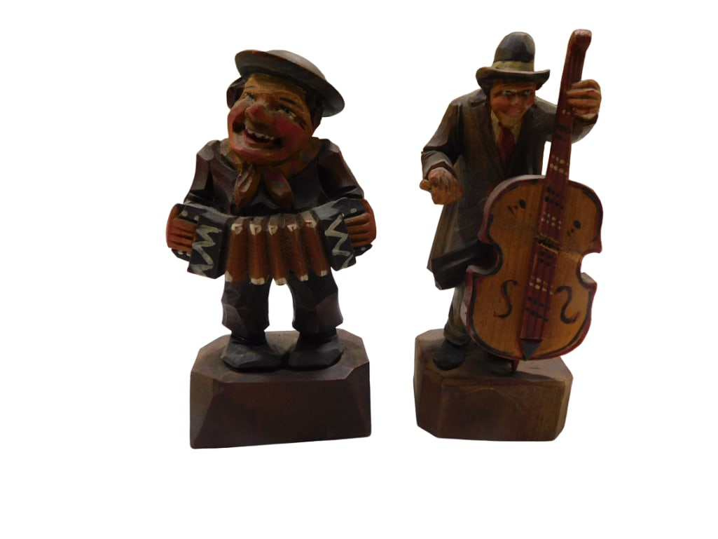 Two German carved and painted wood musician figures; one cello player and one squeezebox / accordion (1 of 3)