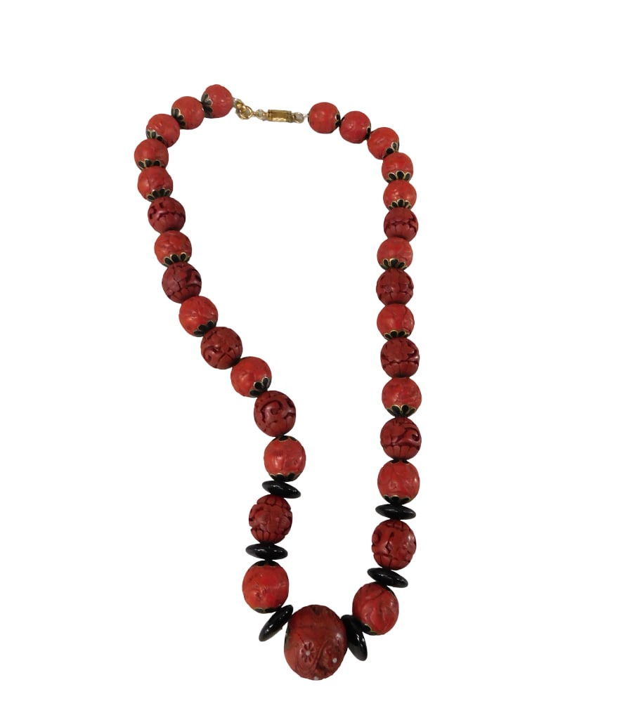 Cinnabar, Enamel and Onyx Bead Necklace with Magnetic Closure Length: 20": Cinnabar, enamel and onyx bead necklace with magnetic closure Length: 20" All pictures are considered part of the description and should be examined carefully by bidders. Live Auctioneers is