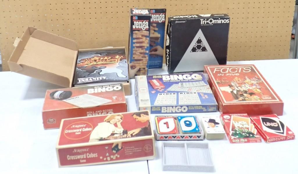 Vintage Game Lot including Uno, Bingo, Tri Ominos, Jenga, Facts in Five, Insanity, etc.: Vintage Game Lot including Uno, Bingo, Tri Ominos, Jenga, Facts in Five, Insanity, etc. All pictures are considered part of the description and should be examined carefully by bidders. Live Auctioneer