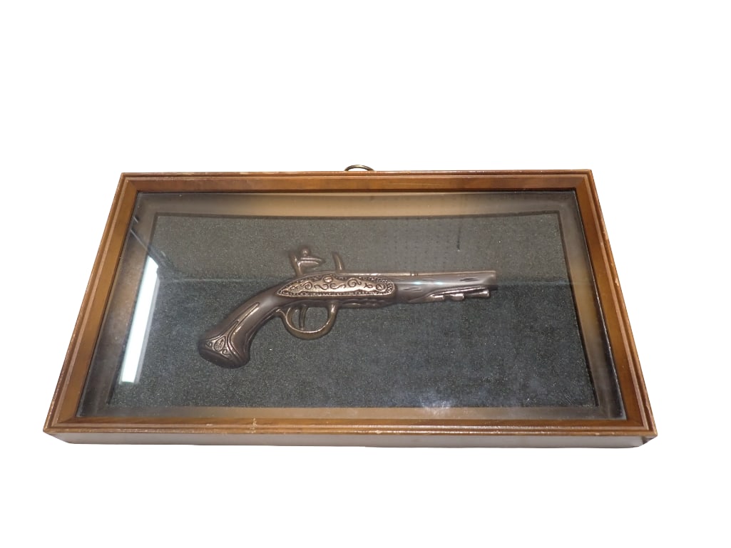 Framed Replica Pistol NOT A REAL GUN: Framed Replica Pistol NOT A REAL GUN. Turner Wall Accessory. All pictures are considered part of the description and should be examined carefully by bidders. Live Auctioneers is now offering Liv