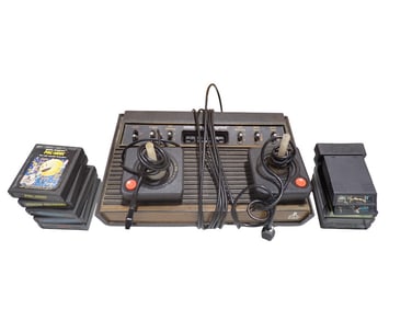 Atari VCS / 2600 Video Game System, Two Controllers and Games including Pitfall!, Haunted House,