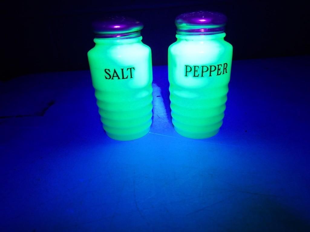 Vintage Jadeite Uranium Glass Salt and Pepper Shakers: Vintage Jadeite Uranium Glass Salt and Pepper Shakers All pictures are considered part of the description and should be examined carefully by bidders. Live Auctioneers is now offering Live Shipping