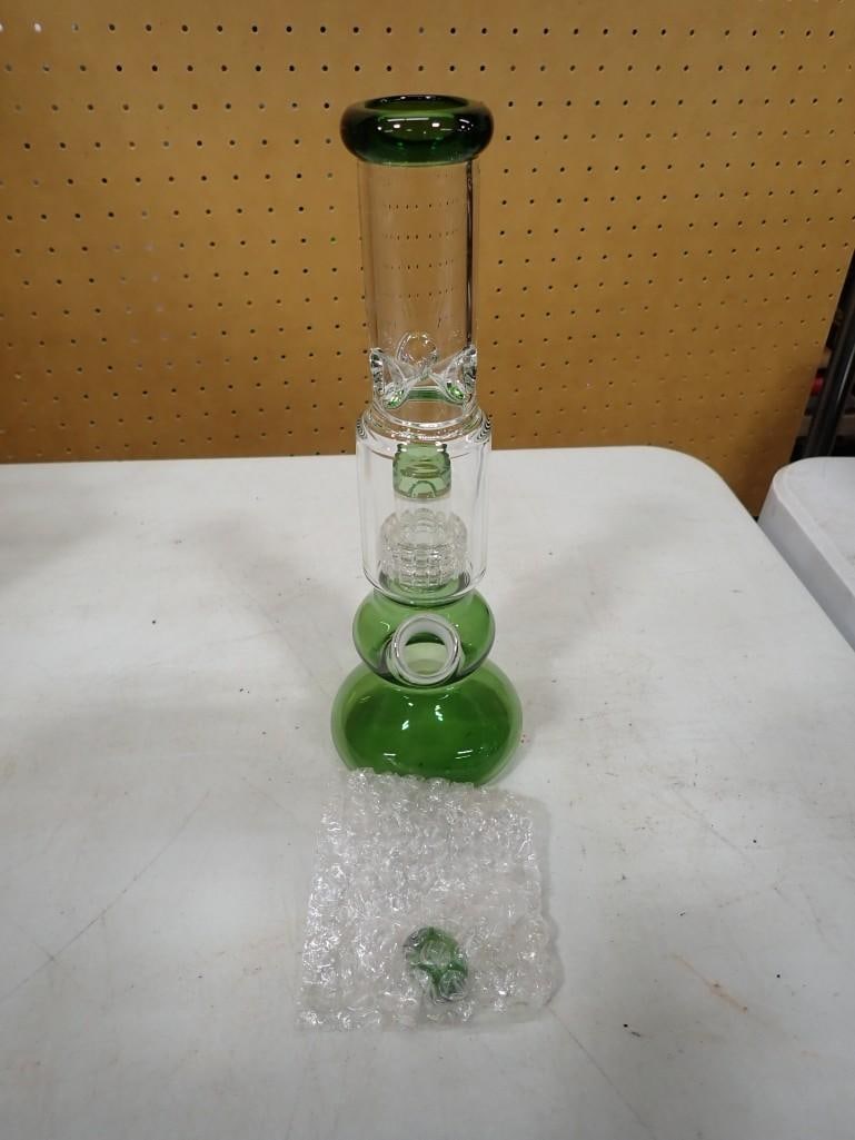 Green Glass water pipe for tobacco: Green Glass water pipe for tobacco All pictures are considered part of the description and should be examined carefully by bidders. Live Auctioneers is now offering Live Shipping through them. T