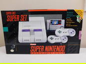 Super Nintendo in Original Box w/ Controllers, Wires, Mario Kart Game, & Paperwork