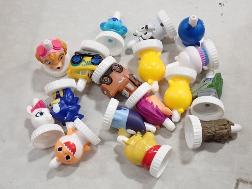 Lot of Juice Toppers & Dolls, Doll Shoes, and Accessories: Lot of Juice Toppers & Dolls, Doll Shoes, and Accessories All pictures are considered part of the description and should be examined carefully by bidders. Live Auctioneers is now offering Live Shi