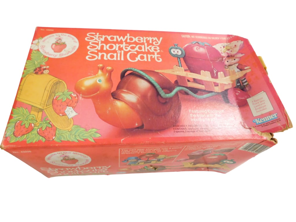 Vintage Strawberry Shortcake Snail Cart in Original Box by Kenner: Vintage Strawberry Shortcake Snail Cart in Original Box by Kenner. Includes everything shown in the pictures. All pictures are considered part of the description and should be examined carefully