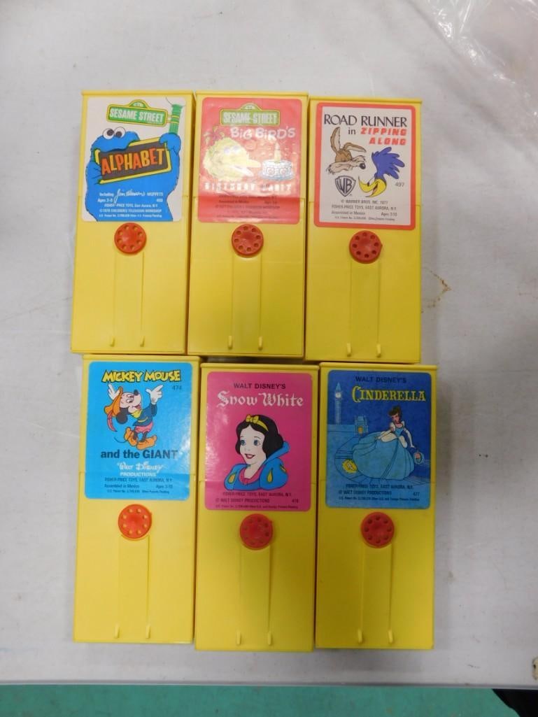 6 Vintage Fisher Price Movie Viewer Cartridges including Walt Disney, Sesame Street, Mickey Mouse, S: 6 Vintage Fisher Price Movie Viewer Cartridges including Walt Disney, Sesame Street, Mickey Mouse, Snow White, Road Runner, Cinderella, etc. All pictures are considered part of the description and sho