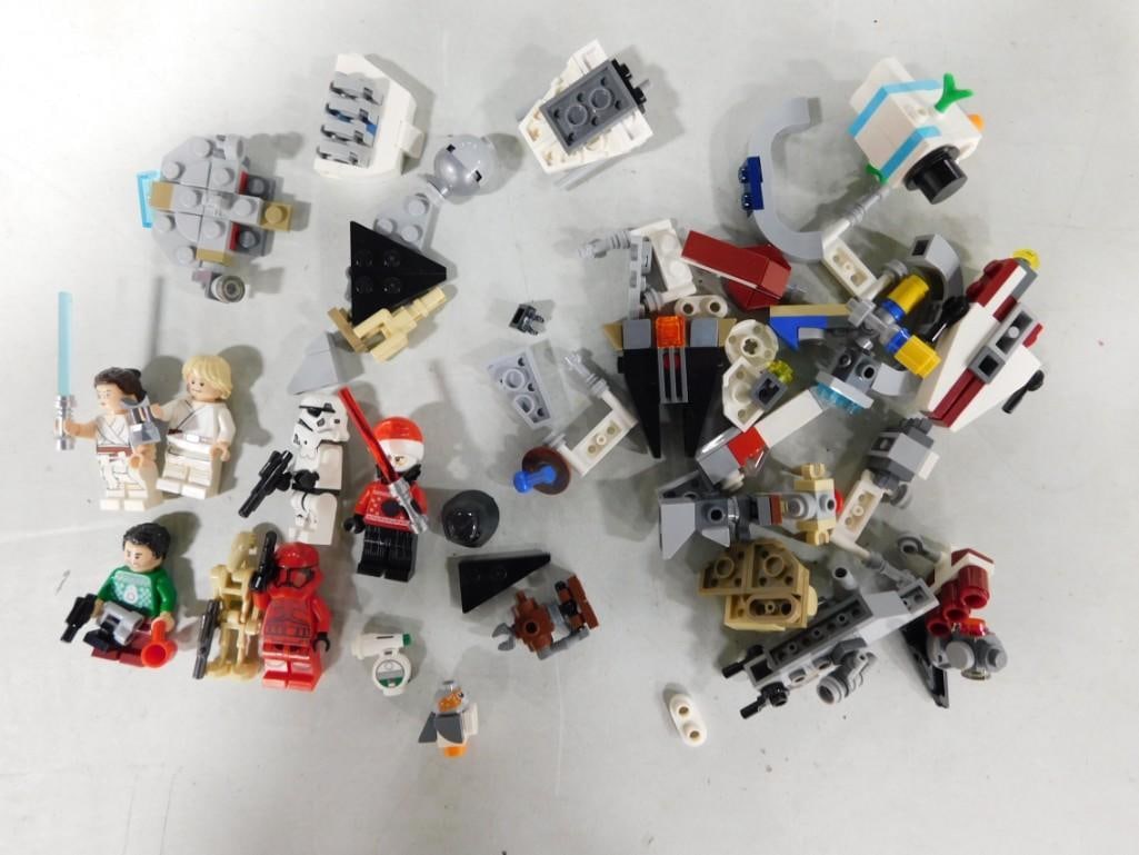 Lego Lot including Star Wars, Mini Figures, etc.: Lego Lot including Star Wars, Mini Figures, etc. All pictures are considered part of the description and should be examined carefully by bidders. Live Auctioneers is now offering Live Shipping through