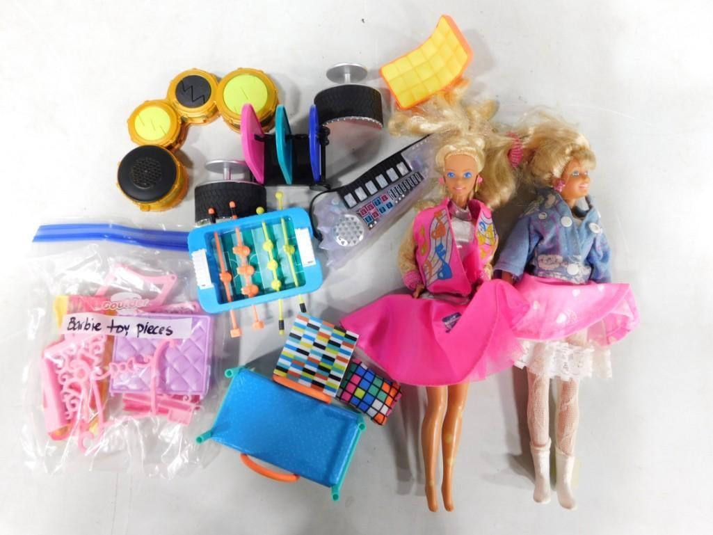 Barbie Doll Lot including Barbies, Toy Pieces, Accessories, etc.: Barbie Doll Lot including Barbies, Toy Pieces, Accessories, etc. All pictures are considered part of the description and should be examined carefully by bidders. Live Auctioneers is now offering Live