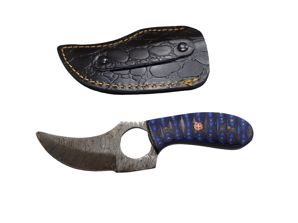 Skinner Knife with Leather Sheath and Wood Handle: Skinner Knife with Leather Sheath and Wood Handle All pictures are considered part of the description and should be examined carefully by bidders. Live Auctioneers is now offering Live Shipping throug