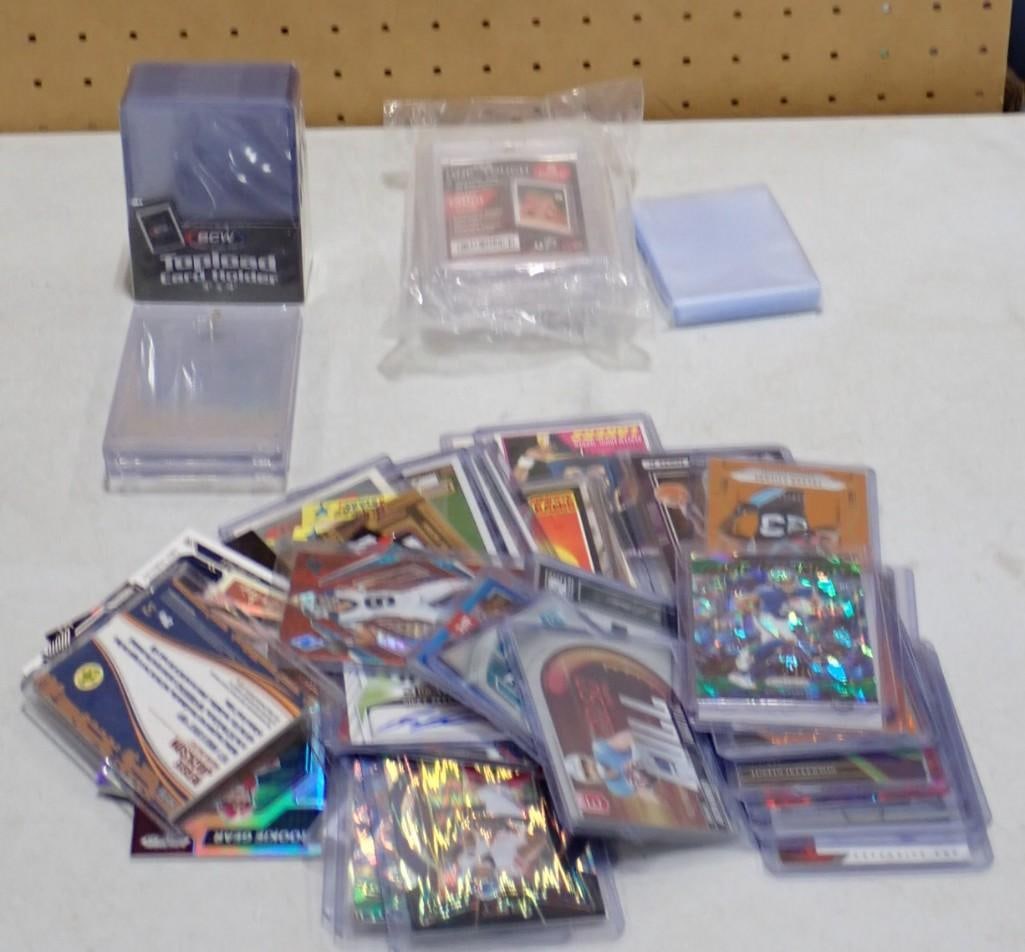 Assorted Football, Basketball Cards, etc. Including Hologram, Vintage, Rookies, Stars, Card Holders: Assorted Football, Basketball Cards, etc. Including Hologram, Vintage, Rookies, Stars, Card Holders, etc. All pictures are considered part of the description and should be examined carefully by bidder